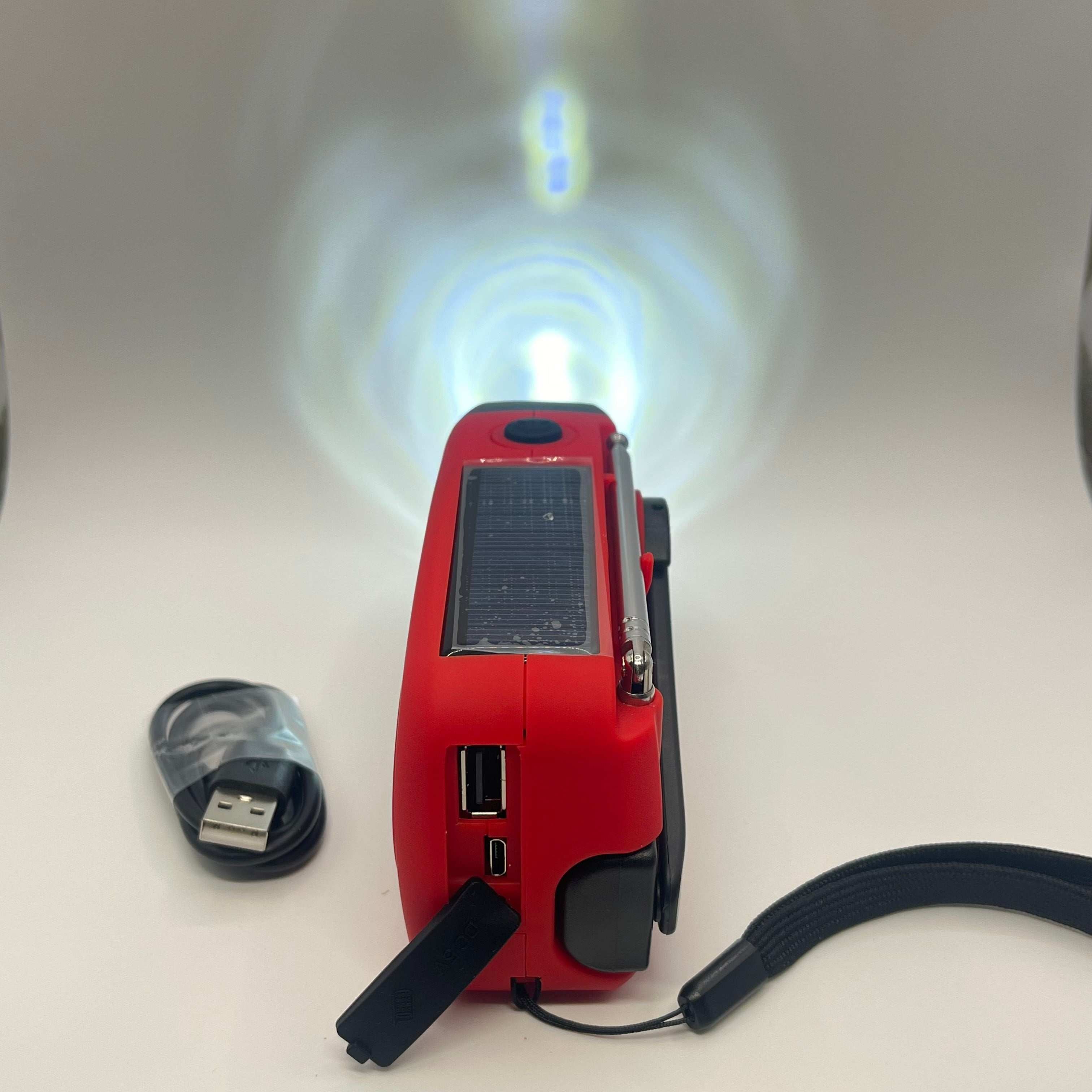 Radio de survie dynamo panneau solaire intégré