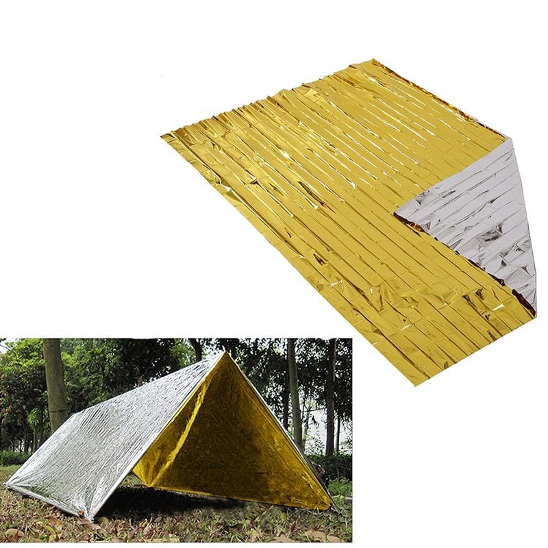 couverture de survie repliée compacte
